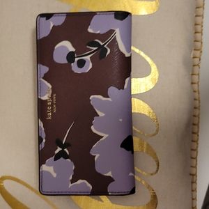 Beautiful Kate Spade Eva Floral wallet. Purple tones.
